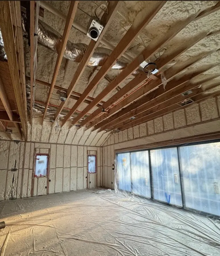 Interior walls and ceiling insulated with spray foam during new construction in Greensburg